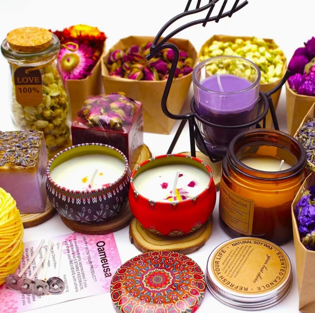 Scented candle making set with dried flowers in jars and tins